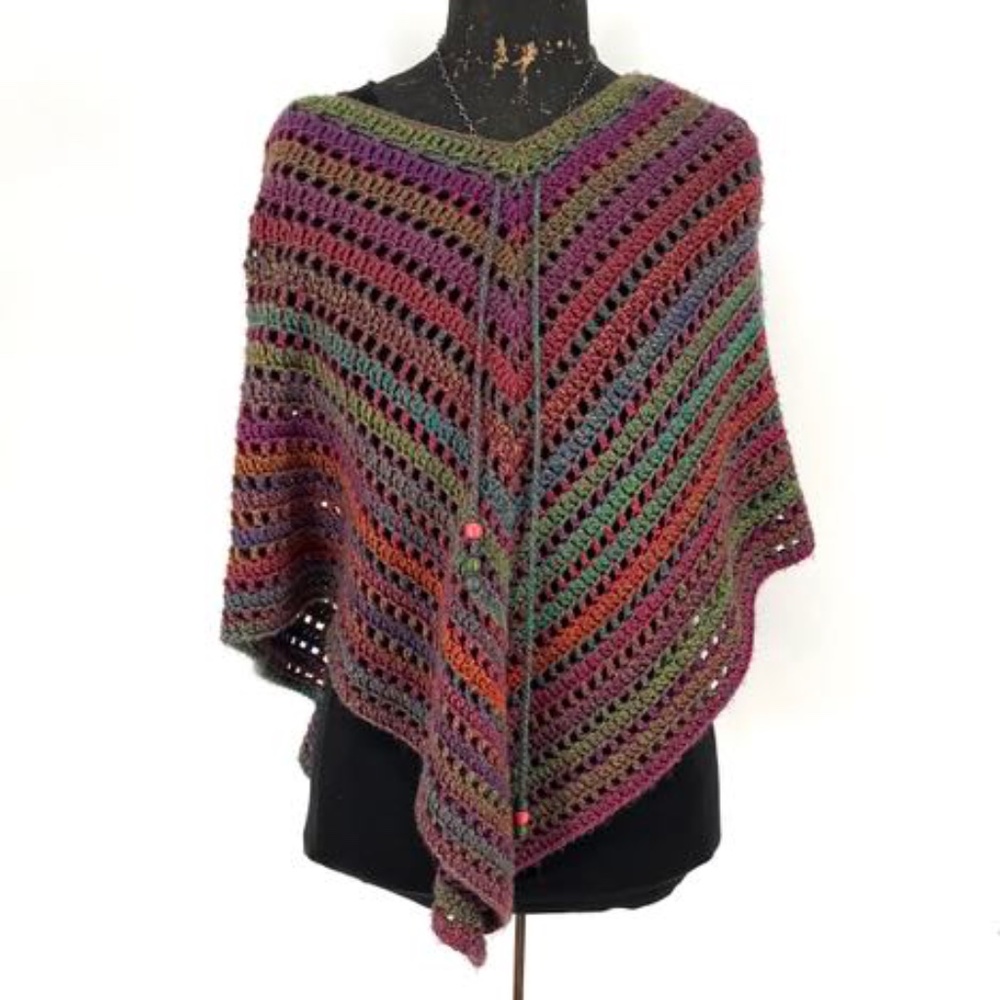 Hand crocheted poncho, beautiful colors.